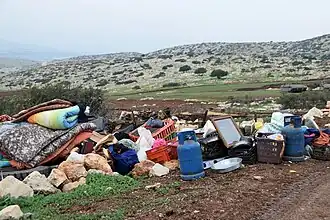 Khirbet Ibziq after residential tent confiscation by Israeli authorities, 2021.