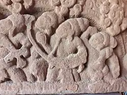 relief sculpture, arched harp