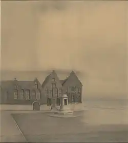 Large gabled brick building beside a monument in an empty cobblestone square, with the sea and sky fading into the background