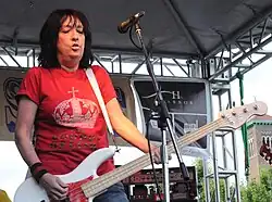 Warnick performing onstage