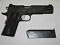 Kimber Custom TLE II, right side with magazine ejected