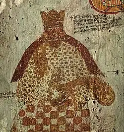 A painting of a man wearing red and white regal clothing and a crown.