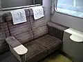 Lower deck seating of a refurbished bilevel car in July 2007