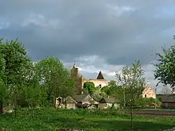 Panorama of Kysylyn with ruins of Catholic church in the background