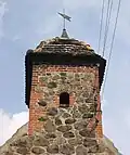 Fieldstone and brick combination on spire in Klein Marzehns, Germany, Late Medieval