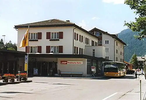 Three-story building with hip roof