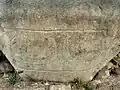Crescent shaped art on kerbstone