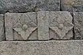 Flowers carving on the walls of one of the Burujulu