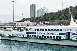 White ferry with "Labuan Express 2" painted on the side