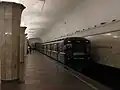 Platform view with an 81-717/714 train leaving