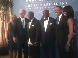 Kingsley Kuku in photographs with the Obamas