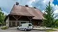 Stork nests on farmhouse