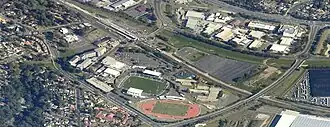 Aerial image of Leumeah; the railway station is on the top left corner; Campbelltown Stadium is towards the right and Mosaic Buildings on the left