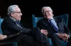 Bob Woodward and Carl Bernstein seated together on stage