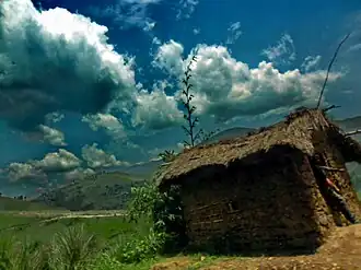 A hut on the side of the mountain road to Burhale–Mwenga, at 6,500 feet above sea level