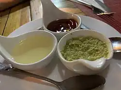 Garlic sauce, green chilli sauce and ketchup (condiments)