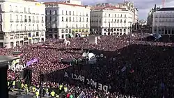 Crowd gathering in party rally in Puerta del Sol in Madrid