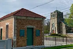 Control building for the dam, Stanhope United Methodist Church in the background