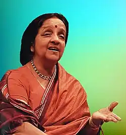Lakshmi Shankar singing in a concert