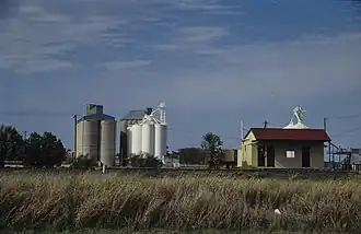 Large grain silos next to the Malu railway station, 2000