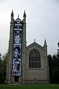 A light-hearted, three-story tiled poster that students mounted on the Chapel in 2008.[158]