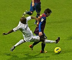 Two players vying for the ball