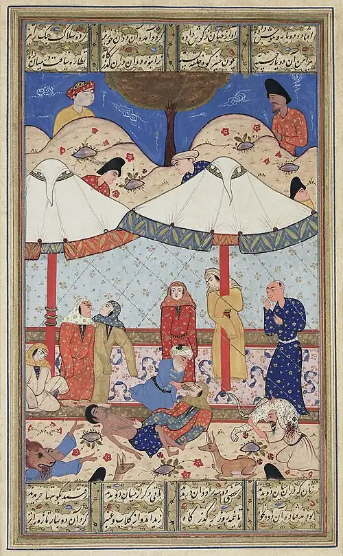 A scene from the romance Layla and Majnun. The thwarted lovers meet for the last time before their deaths. Both have fainted and Majnun's elderly messenger attempts to revive Layla while wild animals protect the pair from unwelcome intruders. Late 16th-century illustration.