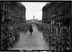 On July 14, 1916, in Paris, the French army infantry paraded down Rue Royale.