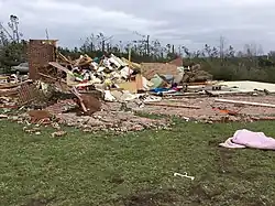 Image 19EF4 damage to a well-built brick home in Beauregard, Alabama. This home was anchor-bolted to its foundation. (from Tornadoes of 2019)