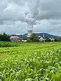 Village of Full and crop fields in foreground