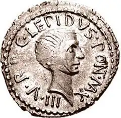 Coin with face and inscription