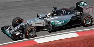 Lewis Hamilton driving a Mercedes F1 W06 Hybrid formula one car.