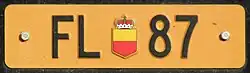 Light brown Liechtenstein license plate for exceptional vehicles and trailers, front plate.