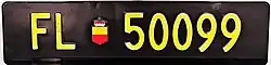 Short-term registration plate, rear plate, long format.
