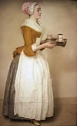 The Chocolate Girl, 1743–45, wears a fitted jacket, petticoat, and apron.