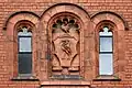 Terracotta coat of arms of the City of Liverpool, Victoria Building, University of Liverpool, located on the second floor above the main entrance