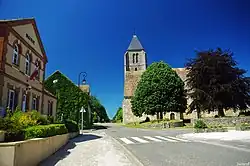 The town hall and church in the centre of Longvilliers
