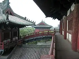 The arch bridge connecting the Dabei ge and Yushu Pavilion; view from the balcony to the south; the roof of Pavilion of Maitreya can be seen in the distance