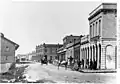 Looking north on Wharf street from Fort street, Victoria. 1866–1870.