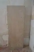 The funerary slab.