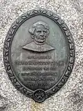 Plaque displaying a portrait of Lucien Galier