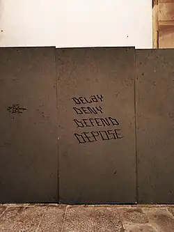 Luigi Mangione inspired graffiti in Lucca, Italy