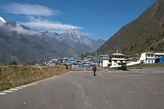 Looking across the township of Lukla, with the air strip of Lukla Airport in the foreground and the mountain Nupla in the background