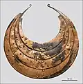 Bronze collar with sun ship motifs.[13]