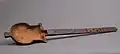A similarity between the Germanic lutes and the coptic lute (which the cithara resembles) is a hollowed arm or neck in each instrument, covered by a soundboard.
