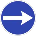 Turn right before sign