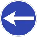 Turn left before sign