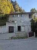 The building at 7029 Senalda Drive, headquarters of Asymmetrical Productions.