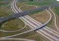 An interchange between the M0 and M4 motorways outside Budapest, showcases directional, semi-directional, and loop ramps. 47°24′18″N 19°18′55″E﻿ / ﻿47.40500°N 19.31528°E﻿ / 47.40500; 19.31528