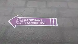 M11 transfer signs on the ground at M7 Kağıthane station